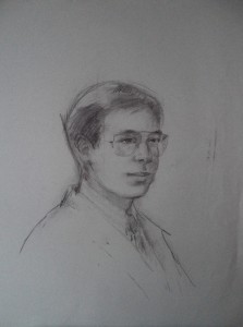 Portret van jongeman met bril